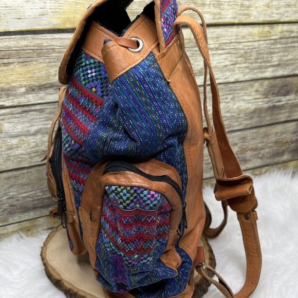 Multicolor Tapestry Embroidered Fabric Tan Leather Trim Drawstring Backpack
